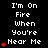 Black background with white pixelated text reading "I'm On Fire When You're Near Me" and red heart symbols, animated to increase in number from one to five hearts per