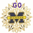 Pixelated starburst-shaped icon with dark blue 'M' symbols and yellow bars, displaying changing text above each symbol.