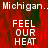 Red background with repeated text 'Michigan.. Michigan..' and 'FEEL OUR HEAT' in white pixelated font, split into four quadrants with one gray