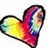 A heart-shaped icon with a rainbow gradient fill transitioning from yellow to red, purple, and blue, outlined in black against a white background.