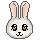 Pixel art bunny head with two distinct expressions: one awake with yellow eyes and a small nose, the other sleeping with closed eyes and 'zzz' text.