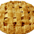 Three pixelated cookies with brown and tan coloring, one displaying text overlay.