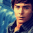 Pixelated close-up of a person with dark hair and a dark jacket against a blue background with light blue and white pixel clusters.