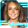 A static image of a person with long brown hair, blue eyes, and light skin wearing a necklace, framed by cyan border elements.
