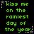 Green pixelated text on black background with white star and dotted line accents, repeating 'kiss me on the rainiest day of the year' in a pattern
