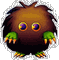 Pixelated cartoon creature with brown body, green limbs, and large purple eyes on a gray background.