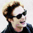 Six distinct show a person with light brown hair in various poses and text overlays including "DUDE," "I DAZZLE MYSELF," and "GOOD JOKE." The style is pixelated, resembling early 2000s digital art