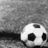 Black-and-white pixelated soccer ball on textured surface with "Soccer" text above and "Love <3" text below, separated by equals sign.