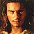 A pixelated contact sheet showing a character with long brown hair on the left and green text reading "Original Icons .com" on the right against a dark background.