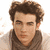 Three side-by-side show a person with curly brown hair in different poses, below which is bold text reading "vines Lines and Trying Times"