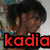 Pixelated image of a person with dark hair and brown skin, wearing a light-colored shirt, with red text reading 'kadia' overlaid at the bottom.