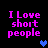 Pixelated text reads "I Love short people" in bright pink on black background with blue heart symbols appearing and disappearing.