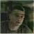 A 50x50 pixel buddy icon split into two frames showing a person with dark hair and green text reading "Original Icons .com" on a dark background.