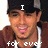 A pixelated image of a person wearing a dark cap and brown hoodie with white drawstrings, displaying text overlays across four