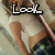 A person in a white crop top and denim shorts poses on a slide with text overlays reading Look, BUT, DON'T!, and TOUCH.