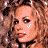 Pixelated image of a woman in red lingerie with curly hair, wearing black wristbands, and standing against a sparkly background with text 'Coolbuddy.com' below.
