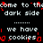 Pixelated text on black background with red glitch effects, repeating 'come to the dark side' and 'we have cookies' in white block letters.