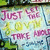 Pixelated image with pink and yellow text reading 'Just You Love Me' over a blurred background of green, blue, and white tones.