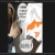 Pixelated figure with brown hair and dark clothing holding a white object, orange shapes visible on the right side of the frame.