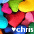 Colorful heart-shaped icons in various hues with a blue banner displaying '❤chris' text, transitioning to a gray background.