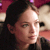 A pixelated close-up of a person with dark hair, light skin, and a neutral expression, partially cropped on the right side.