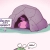 Pixelated image of a purple cave entrance with pink interior, light blue water below, and partial white text on left.