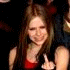 showing a person with long brown hair in red and black clothing, making gestures while text overlays change from 'F*CK' to 'YOU!' across the sequence