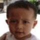 A child in a white shirt appears in two side-by-side frames with differing facial expressions and background details.