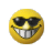 Static pixelated yellow emoji face with black sunglasses and a wide toothy grin on gray background.