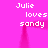 Pixelated text 'Julie loves sandy' repeated in four positions on a bright pink background with faint vertical lines.