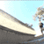 Animated contact sheet showing three sequential frames of a skateboarder performing tricks on a ramp under clear blue sky.