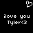 Pixelated white text and symbols on black background: two identical 'ilove you Tyler<3' messages side-by-side with a heart outline above.