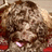 Pixelated dog image with orange background and white text reading 'this is deff my fav dogg' in four sections.