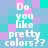 Pixelated text 'Do you like pretty colors??' repeated across a of pastel-colored squares in cyan, purple, and pink