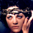 Static 48x48 pixel icon of a person with dark hair wearing a headband, hand near face, against dark background.