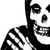 Black-and-white pixelated skeleton with striped shirt, holding a large dark rectangular object against white background.