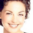 Static 48x48 pixel icon of a smiling woman with short brown hair, visible from shoulders up against a white background.