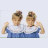 A contact sheet of a 4-frame animation showing two identical cartoon girls in blue dresses with white collars, paired with text "you got it dude" on black background.