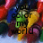 Pixelated image with bold black text reading 'you color my world' over a multicolored abstract background of red, blue, green, yellow, and purple hues.