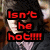 A pixelated image of a person with dark hair wearing a dark sweater over a light purple shirt, featuring red text reading "Isn't he hot!!!!!" on the left side.
