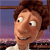Animated sequence showing a character with brown curly hair smiling, holding a gray rat, with a cityscape background featuring the Eiffel Tower.