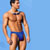 Static pixelated image of a shirtless male figure in blue swim trunks against a solid light blue background, rendered with low-resolution blocky pixels and visible dithering.