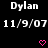 Black background with repeated white text 'Dylan' and date '11/9/07', pink heart symbols, and a gray rectangle in the bottom-right corner.