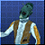 Pixelated figure with greenish head, brown vest over white shirt, and extended arm against blue grid background.