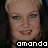 Pixelated close-up of a person's face with light brown hair, showing eyes and mouth against dark background; white text 'omondo' at bottom.