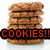 Stack of brown cookies with visible chocolate chips, overlaid by a black banner with red pixelated text reading 'COOKIES!!'.