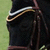 A horse's head in a bridle with white and gold trim, shown across where the rightmost frame includes a purple rectangle with blue text