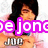 A pixelated image of a person with long dark hair wearing a light pink top, overlaid with bright purple text reading "jone jone" and gray metallic-style text below.