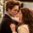 Animated sequence showing a couple kissing, a hand holding an apple, and a close-up of two faces in profile.