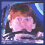 Four pixelated show a person with brown hair in top-left, close-up of mouth in top-right, red-haired person smiling in bottom-left, and 'FLY RON FLY' text in bottom-right